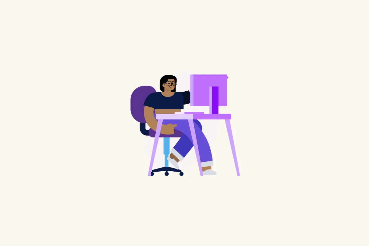 Illustration of a person working at a desk.