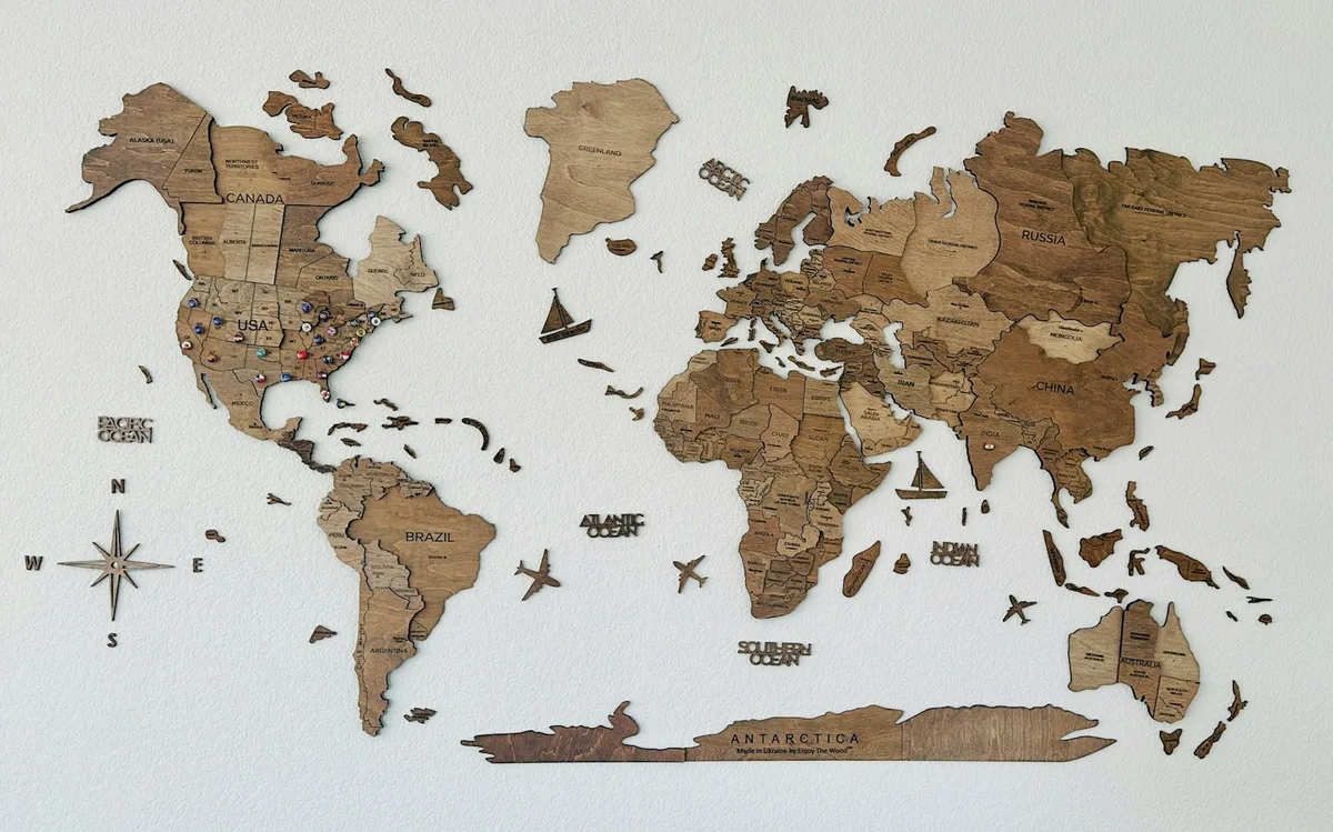 A map of the world made out of wood.